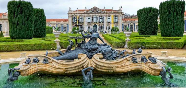 The Rococo façade and formal gardens of Queluz Palace